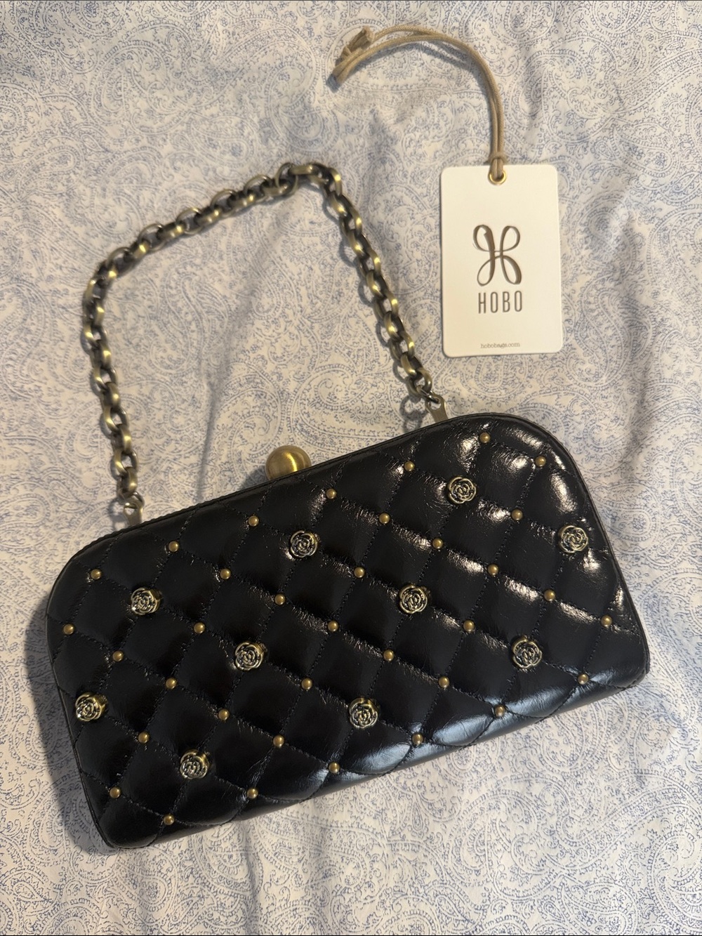 HOBO Black Quilted Leather Clutch with Gold Rosette Studs
